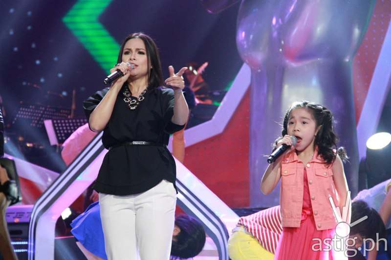 Coach Lea with Darlene during Sunday show's opening number