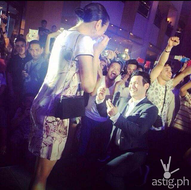 John Prats proposes to Isabel Oli in front of a flash mob, compelte with LED video and fireworks