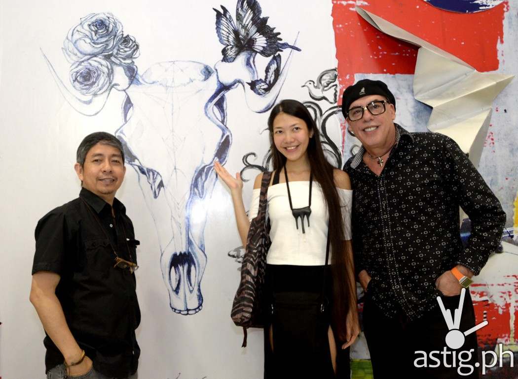 Artist Feanne shows off her work, which transforms Globe stores into both a technology hub and an art gallery