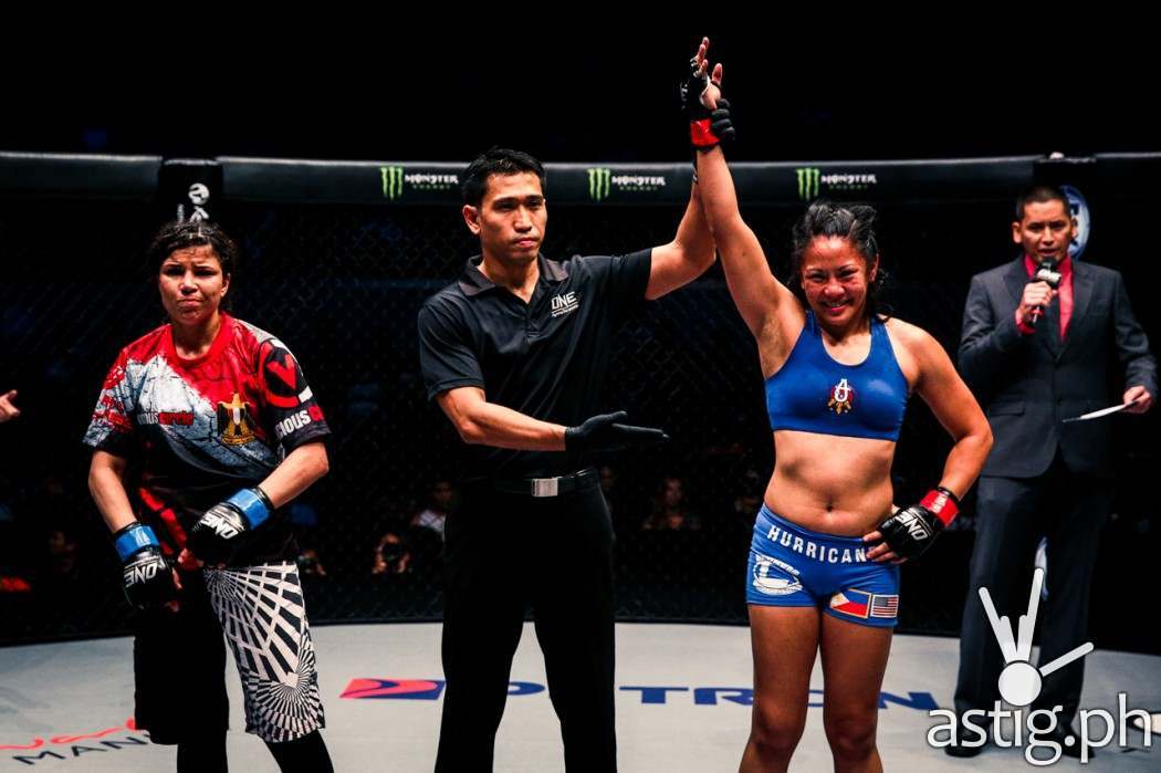 Ana Julaton is all smiles as she proves herself triumphant over Walaa Abas