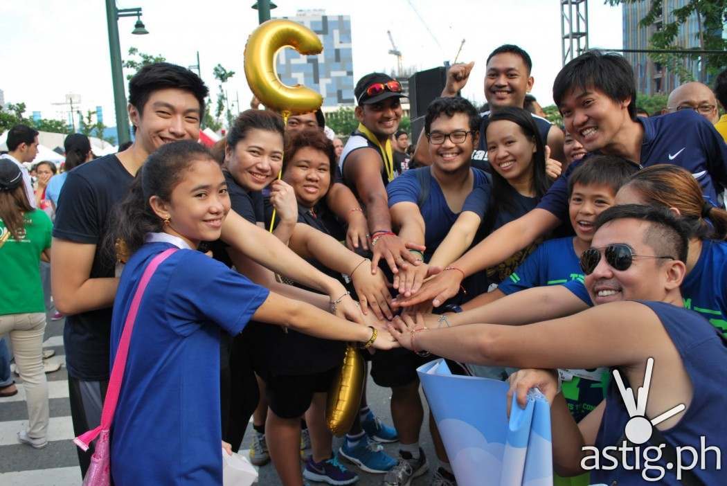 Wish Kid Amie (far left) with the IPC team at the Walk for Wishes event.