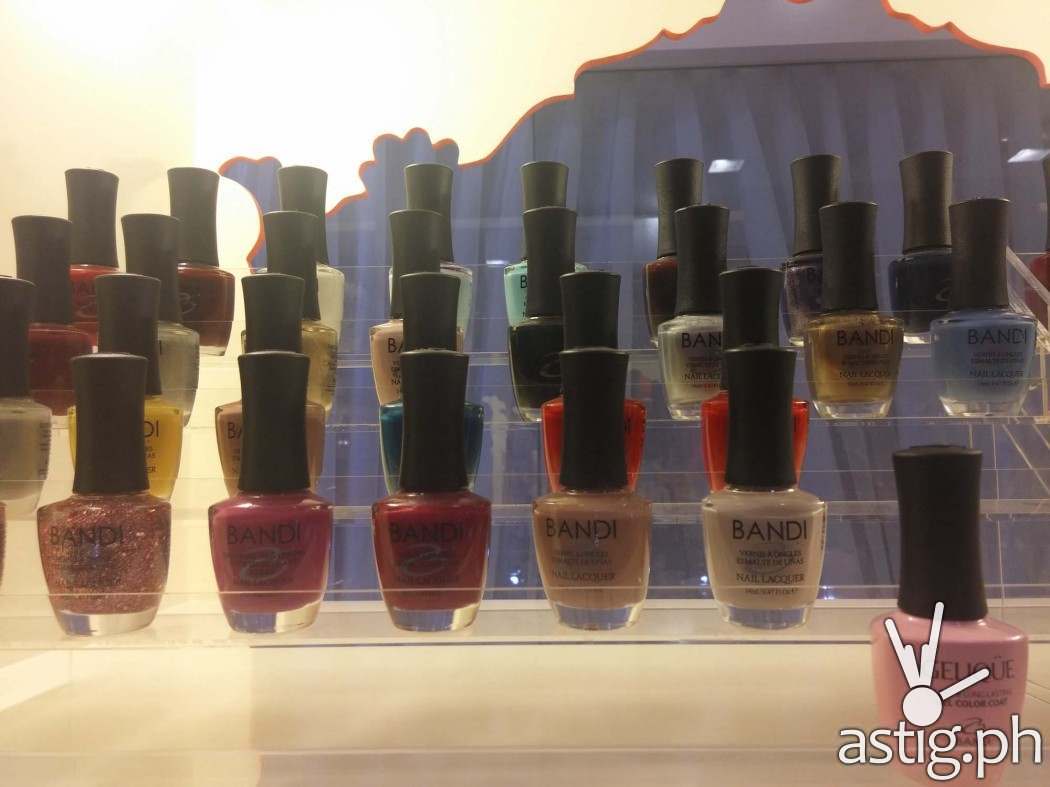 Bottles of Bandi and Gelique nail polish at Extraordinail