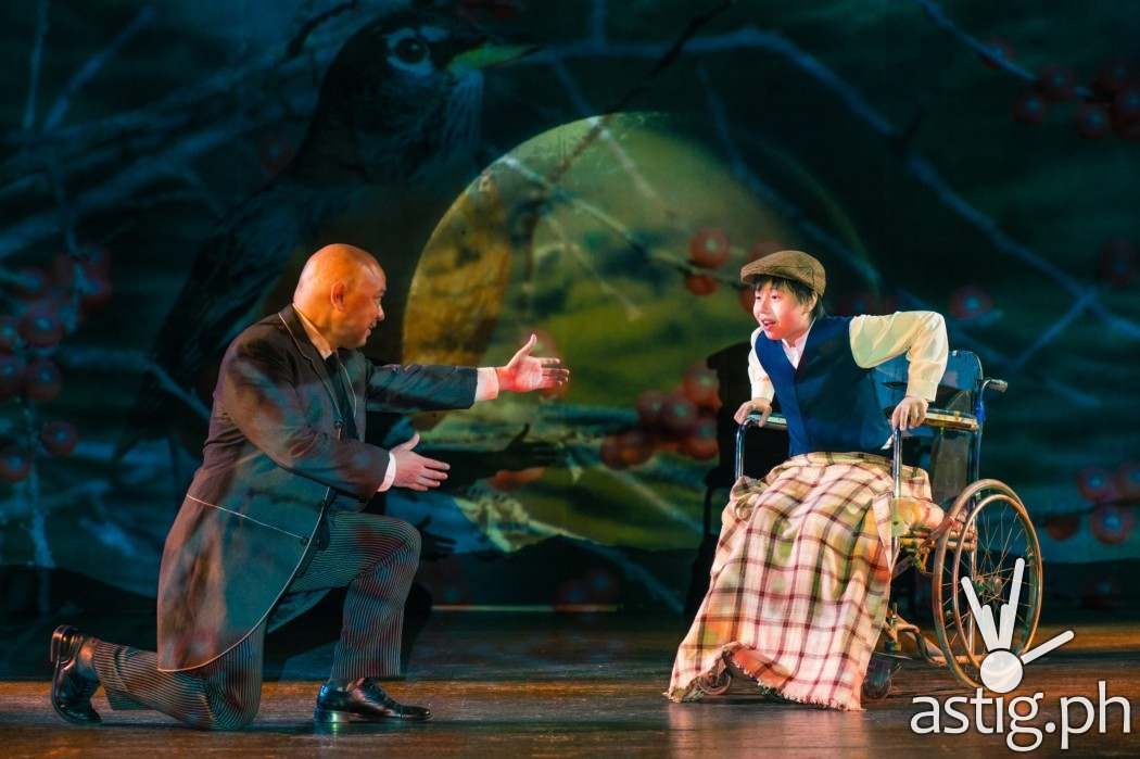 Archibald Craven played  by Robbie Guevara reaches out to his son Colin_ acted out by Daniel Drilon.
