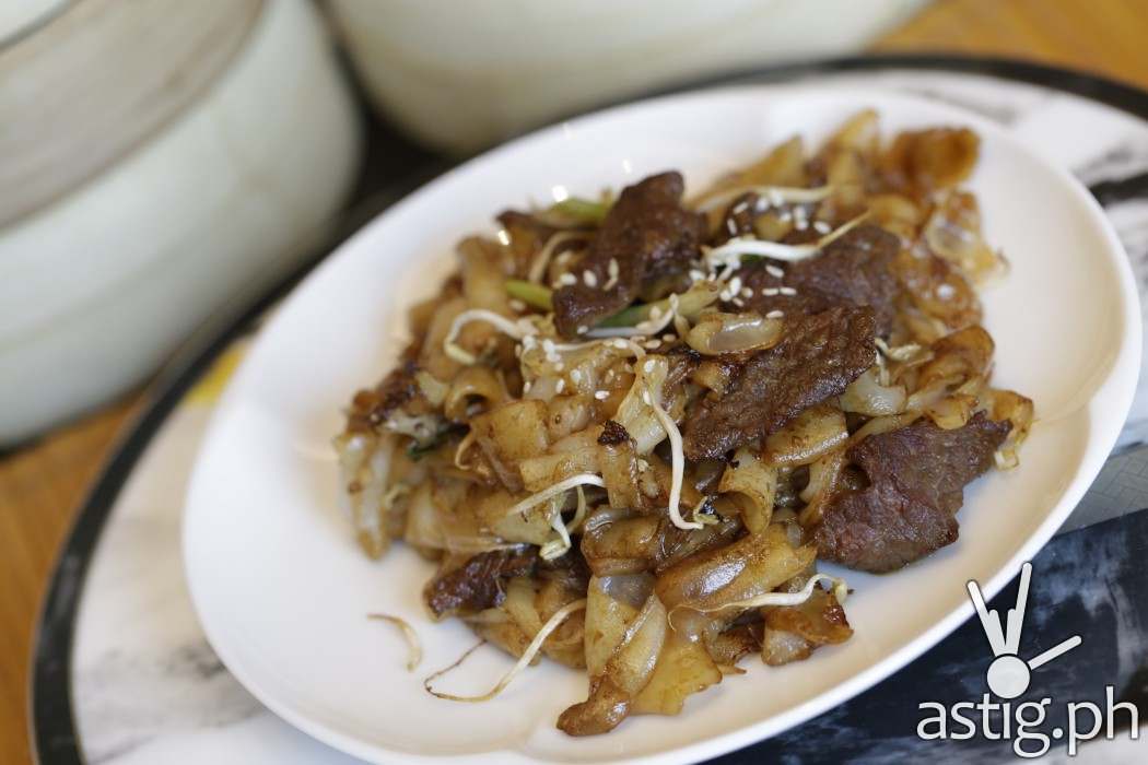 Braised E-fu Noodles with black mushrooms and vegetables at Man Ho