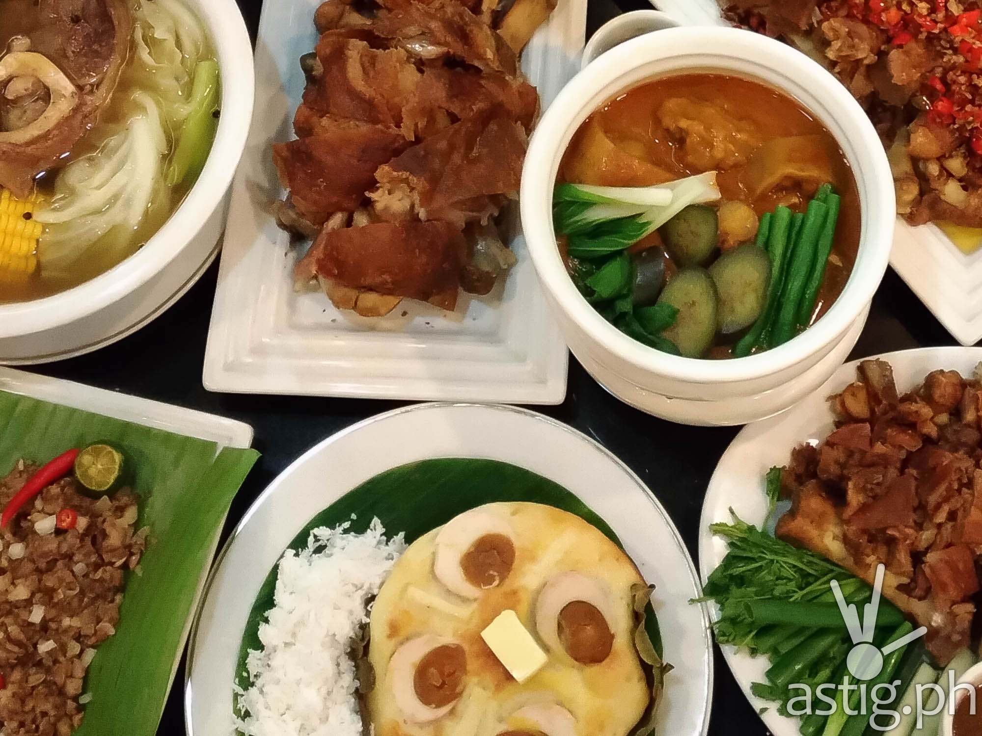 Clockwise from top-left Bulalo with Mais, Original Crispy Pata, Kare-Kare, Patang Demonyo, Crispy Pata, Prichon Pata, Bibingka, Sisig ni Mely - Mangan Restaurant Glorietta 2