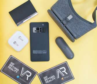 ASUS Zenfone AR with Google Daydream View headset, remote control, and ZenEar headset