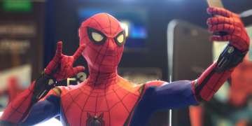 Cosplayer Dranzerdice as Spiderman taking a selfie with the OPPO F3 black edition