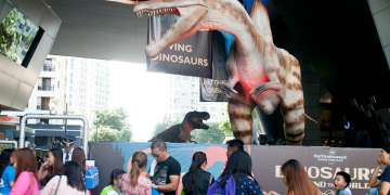 Spinosaurus and Tyrannosaurus Rex - Dinosaurs Around The World exhibit - Mind Museum BGC