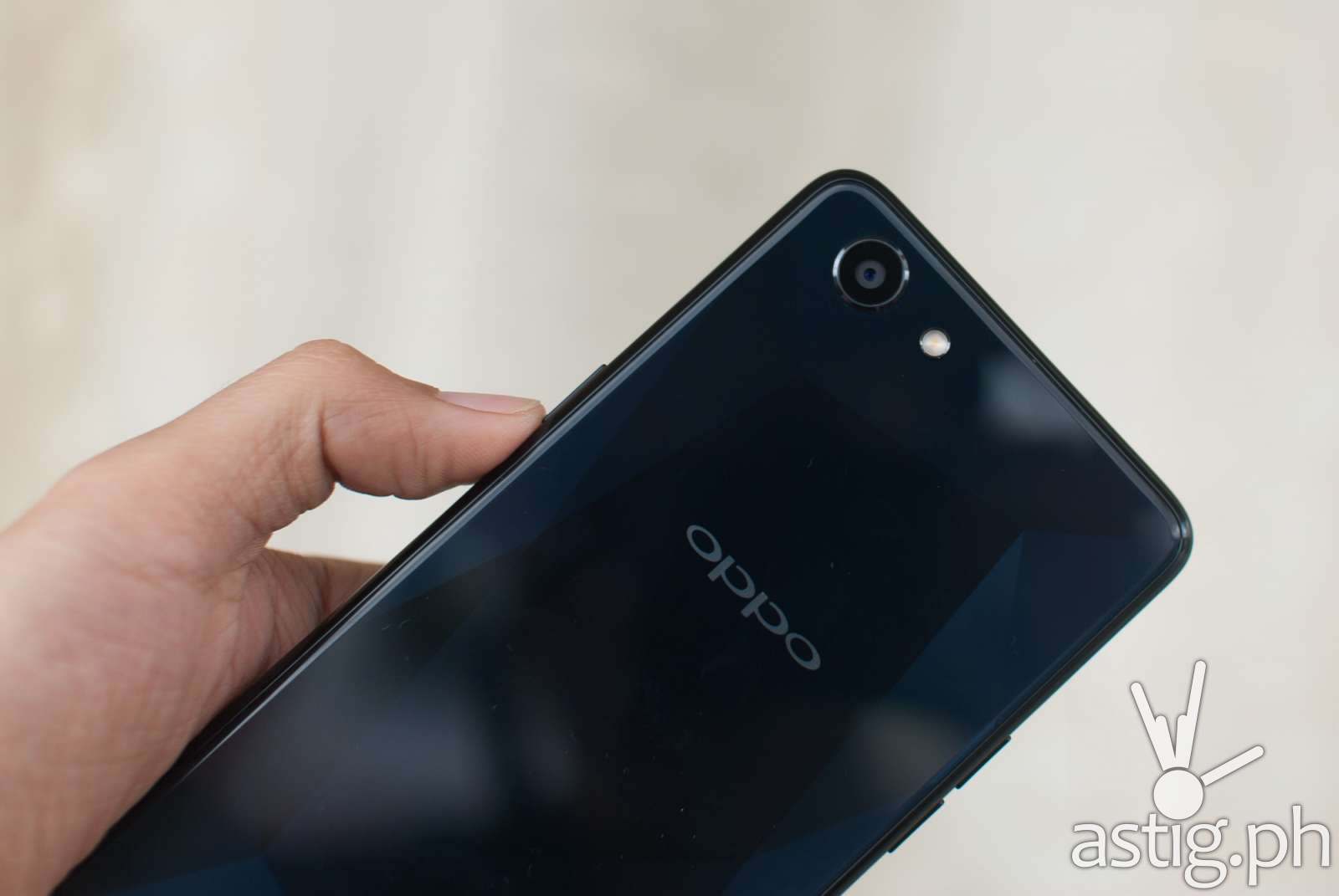 OPPO F7 Youth rear handheld showing camera