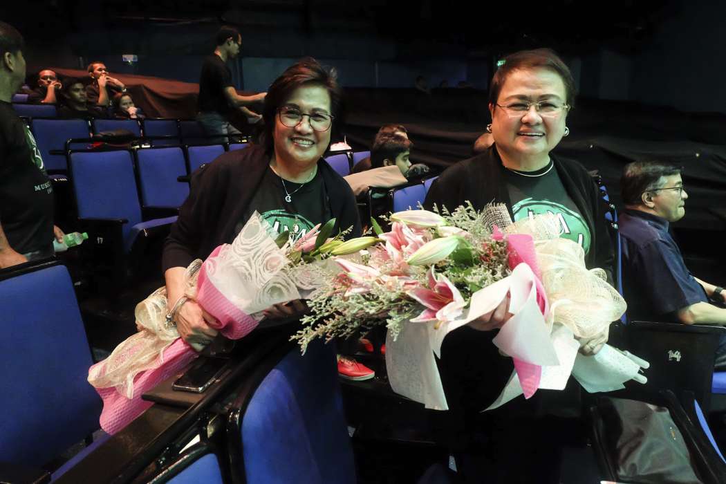 Music Museum President Precy M. Florentino and Vice President Rosie F. Mendoza receive bouquets at the intimate get together with Music Museum staff
