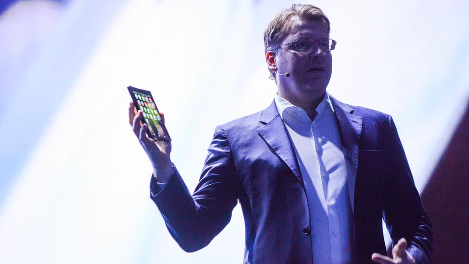 Justin Dennison, SVP for Mobile Marketing at Samsung shows the Galaxy X or Galaxy F (Photo by Angela Lang/CNET)