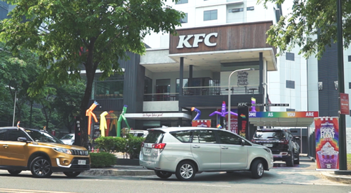 Cars line up at the Pride-Thru
