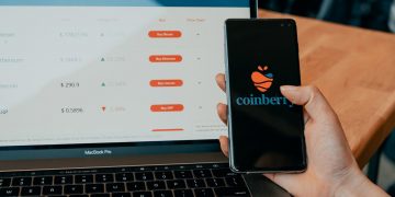 black iphone 7 plus on macbook pro